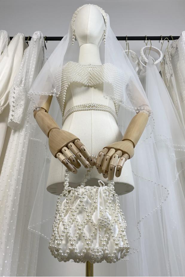 
						Сумочка из жемчуга